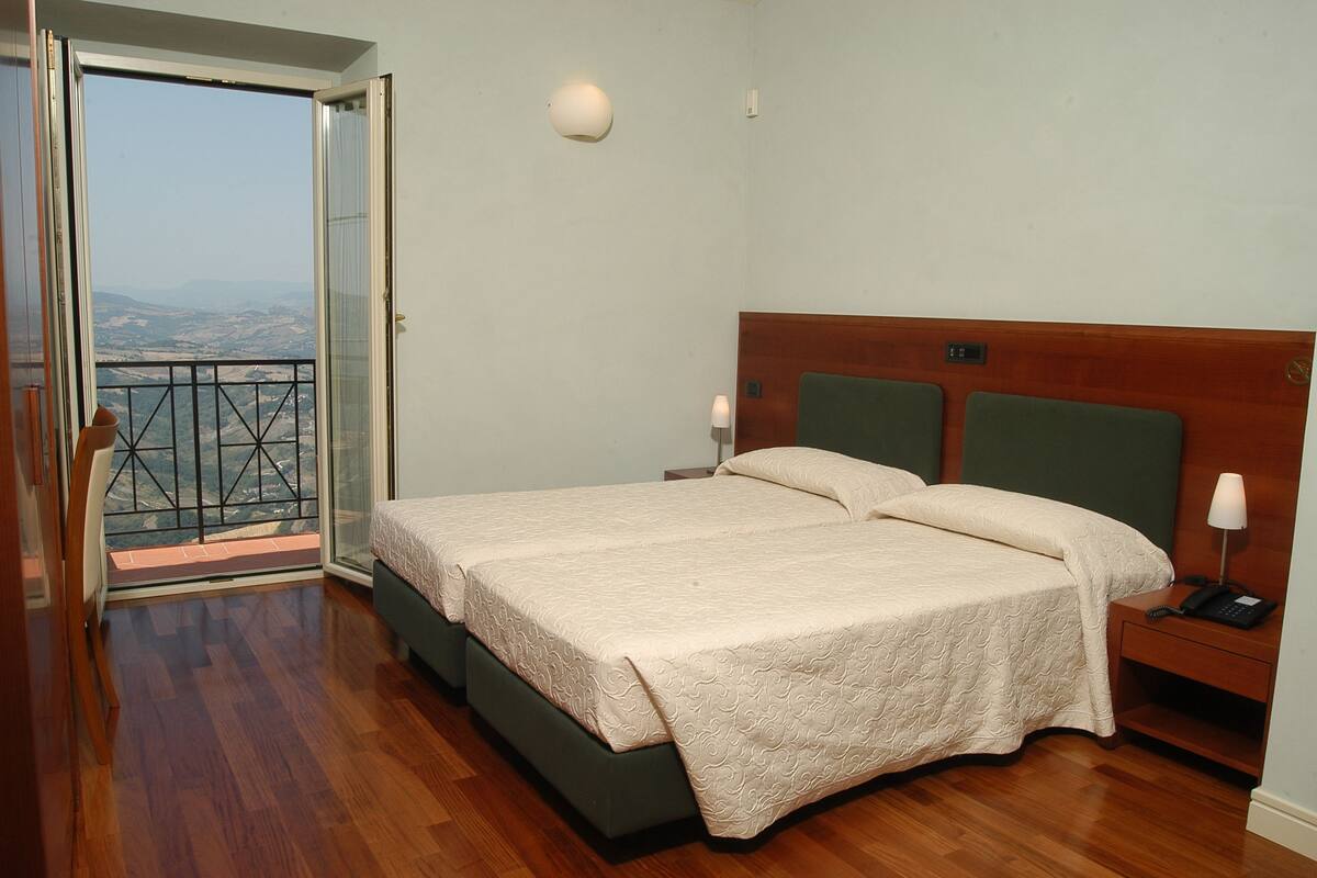 premium bedding, down duvets, minibar, in-room safe