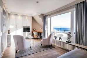 Junior Suite, Sea View, Beachside (Loggia) | Living area | Flat-screen TV