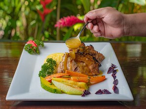 Breakfast, lunch, dinner served; local cuisine, garden views