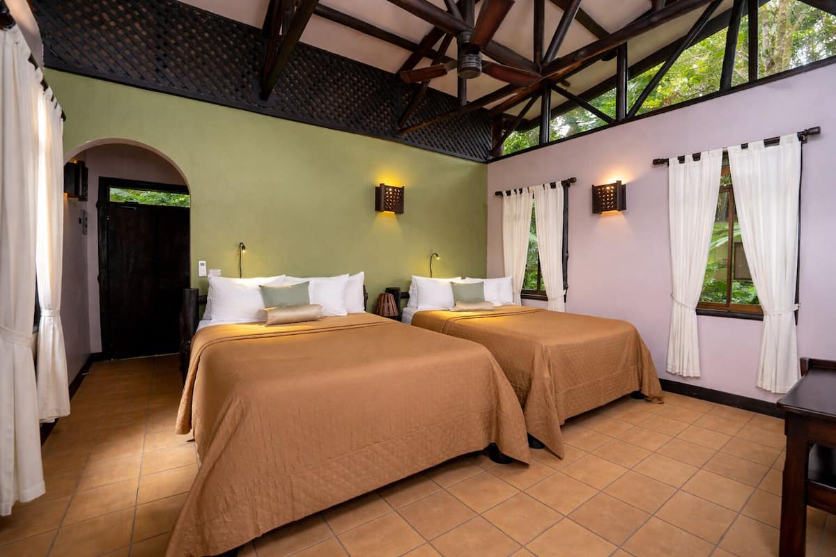 Bungalow, 2 Queen Beds | Desk, free cribs/infant beds, bed sheets, wheelchair access