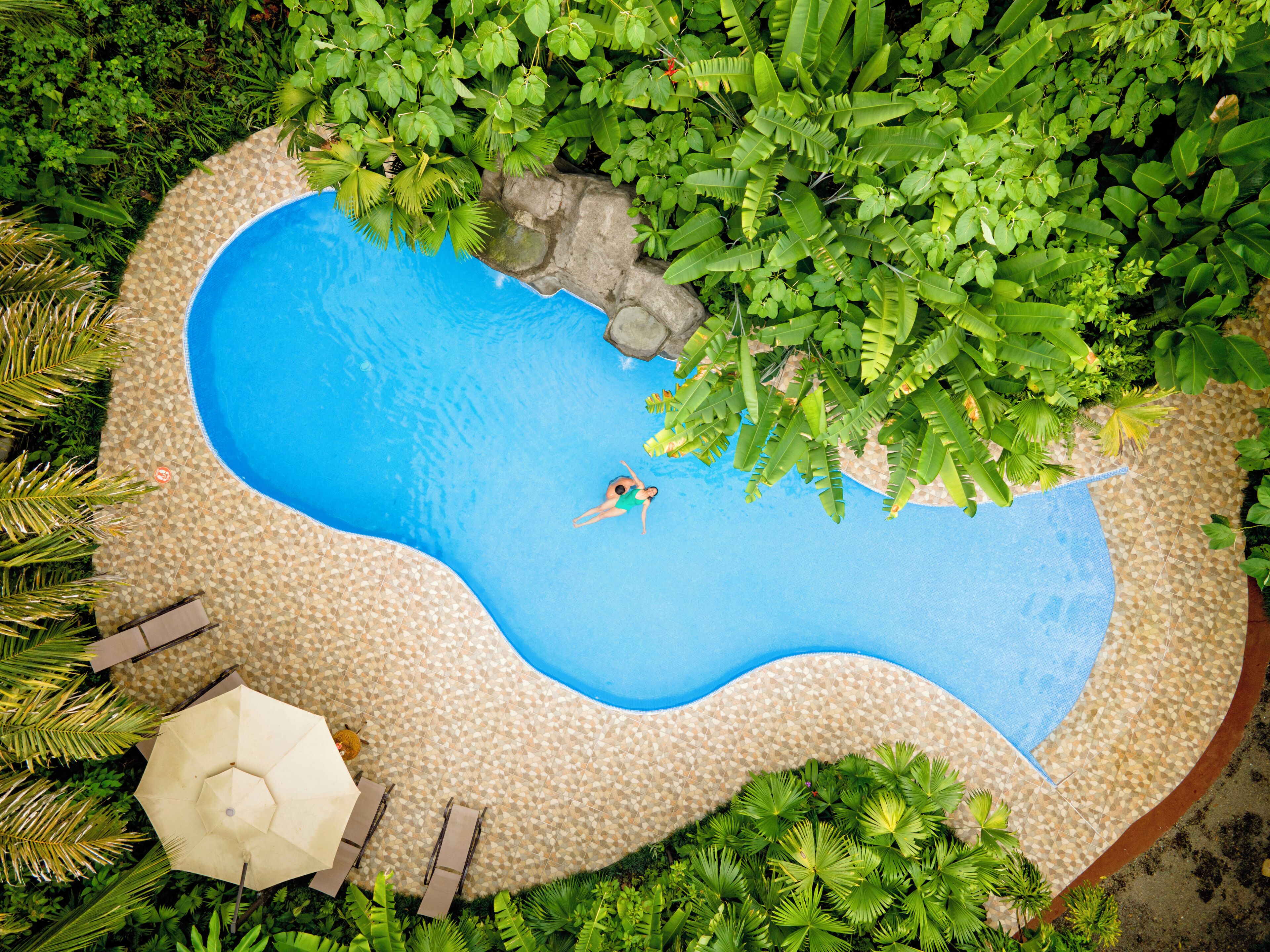 Outdoor pool, open 7:00 AM to 9:00 PM, sun loungers