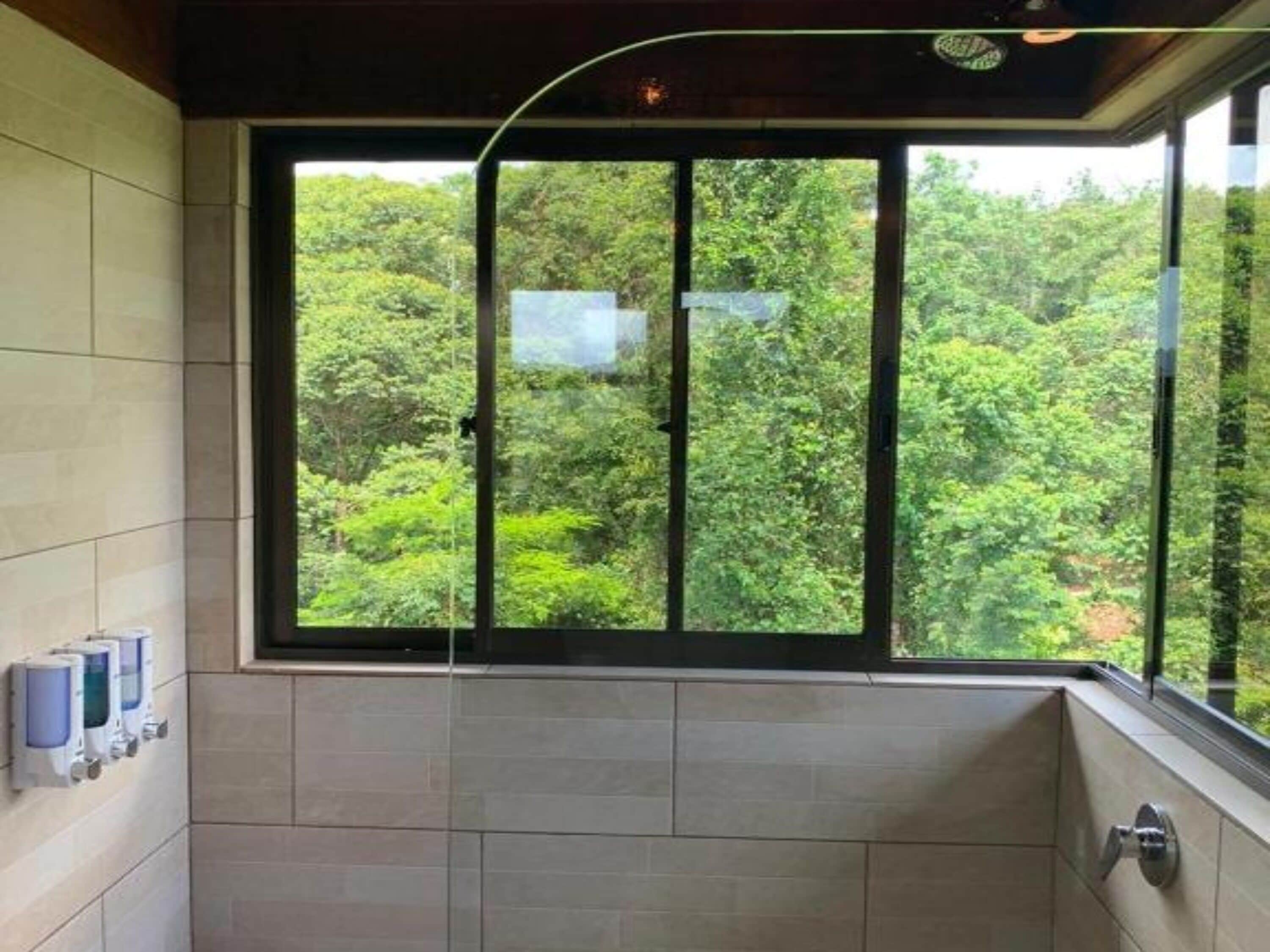 tree house, multiple beds, mountain view | bathroom | shower, rainfall showerhead, eco-friendly toiletries, towels