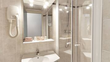 Articles de toilette gratuits, sĂšche-cheveux, serviettes fournies