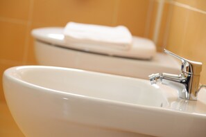 A bathroom sink with a chrome faucet and a white basin. - Hotel Sogni D'Oro Airport (Lamezia Terme)
