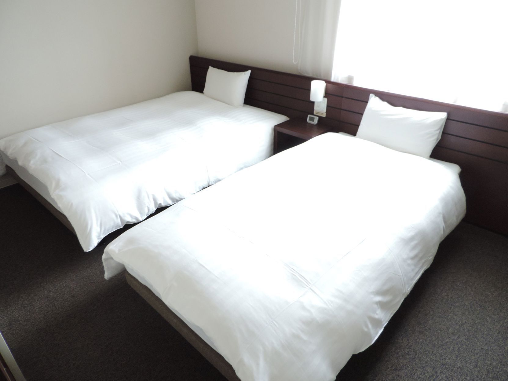 Premium bedding, down duvets, desk, blackout curtains