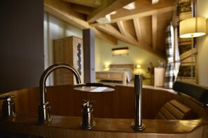 Junior studio suite, aan tuin | Kamervoorziening