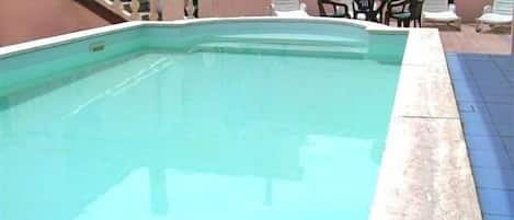 Outdoor pool, sun loungers