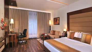 Premium bedding, free minibar items, in-room safe