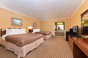 Deluxe Room, 2 Queen Beds | Premium bedding, desk, laptop workspace, blackout drapes