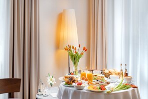 Deluxe Room, 1 King Bed | In-room dining