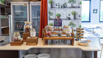 Desayuno buffet diario (EUR 16.90 por persona)