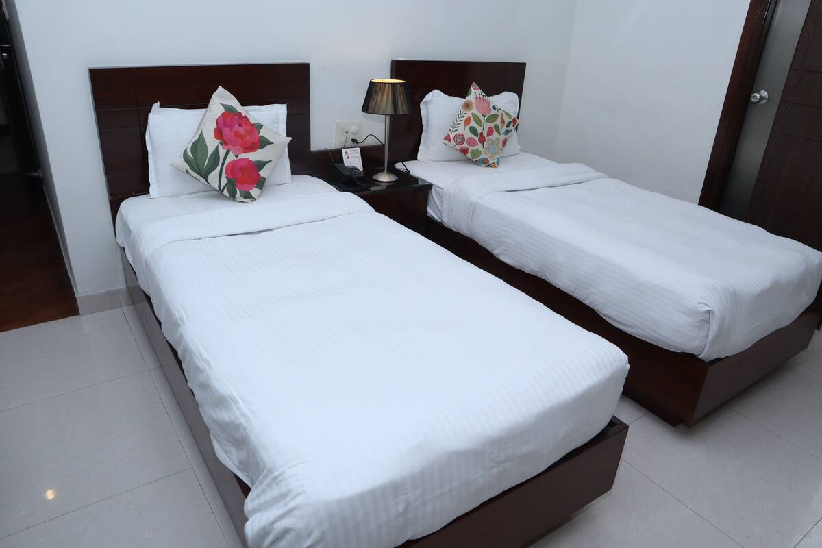 desk, bed sheets, wheelchair access