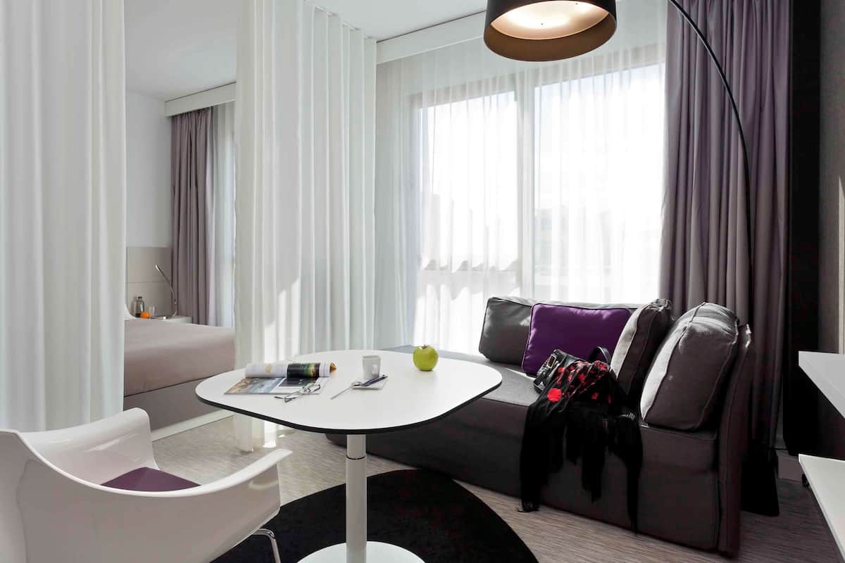 Premium bedding, down duvets, minibar, in-room safe