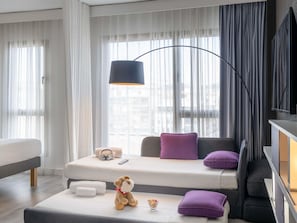 Premium bedding, down comforters, minibar, in-room safe
