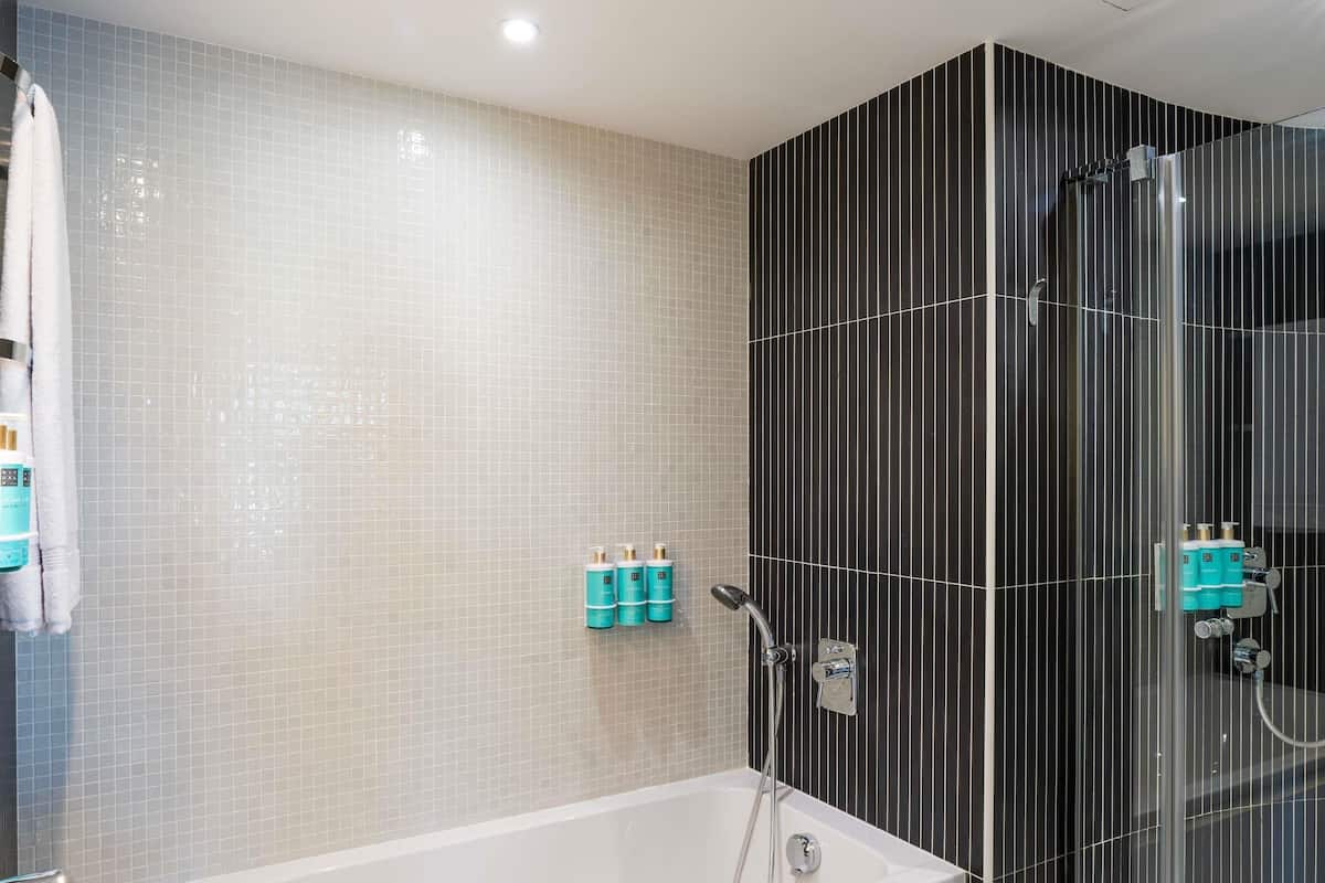 Premium bedding, down comforters, minibar, in-room safe