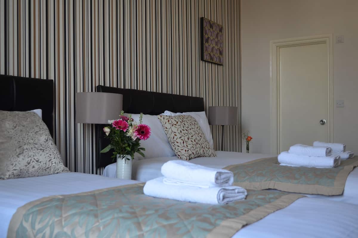 Standard Quadruple Room | Iron/ironing board, free WiFi, bed sheets