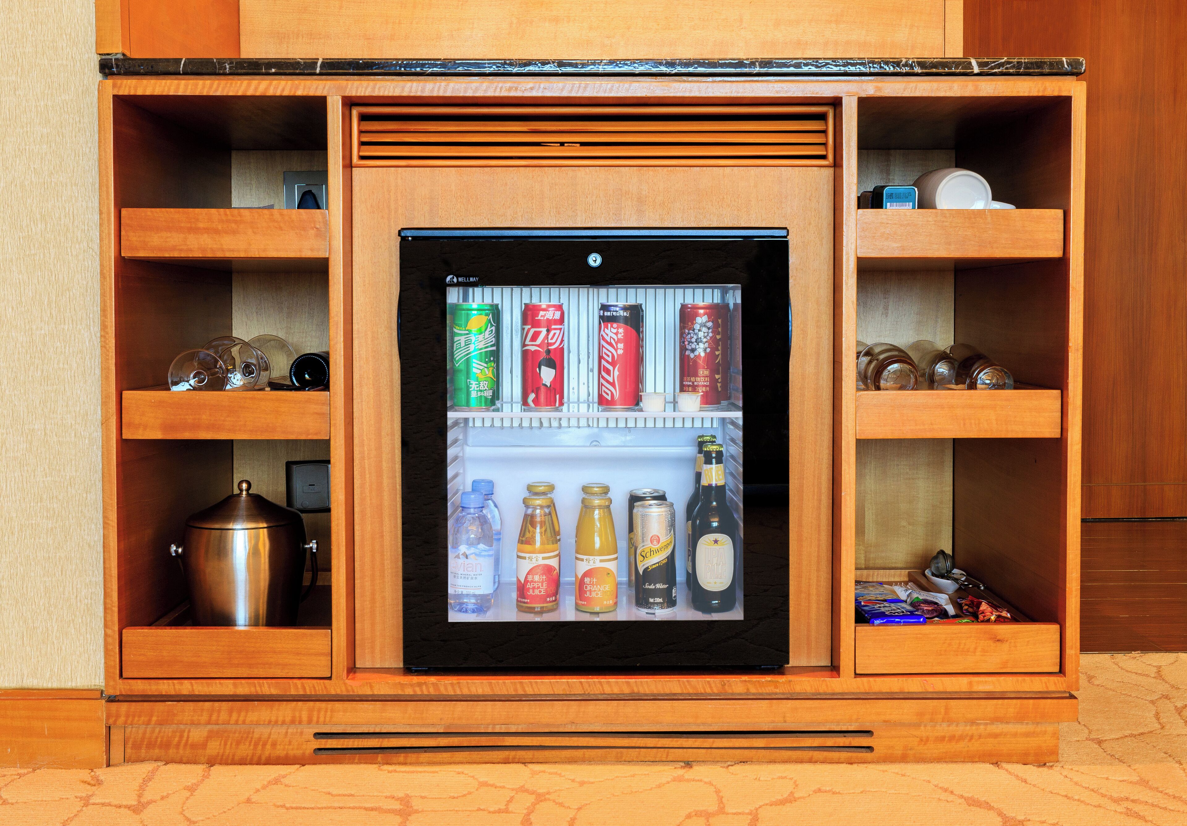 Premium bedding, down duvets, free minibar items, in-room safe