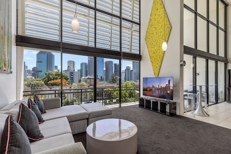 1 Bedroom Loft Penthouse | Living area. The Docks on Goodwin