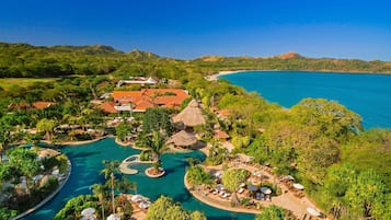 Outdoor pool, open 8:00 AM to 5:00 PM, pool umbrellas