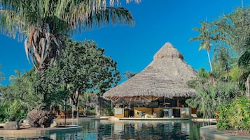 Outdoor pool, open 8:00 AM to 5:00 PM, pool umbrellas