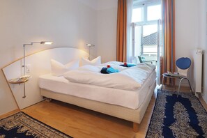 Premium bedding, in-room safe, blackout curtains, soundproofing