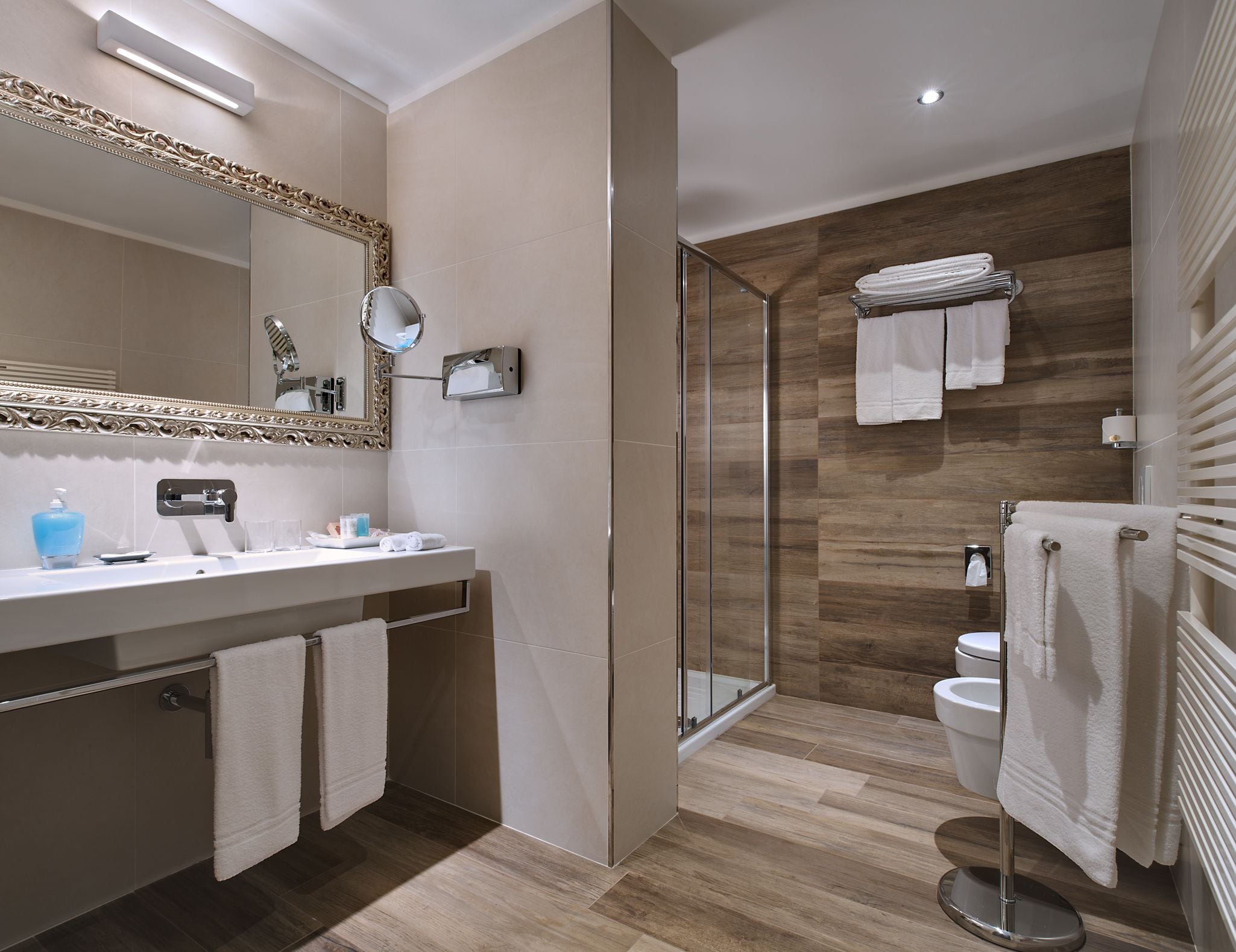 superior suite | bathroom | shower, free toiletries, hair dryer, bathrobes