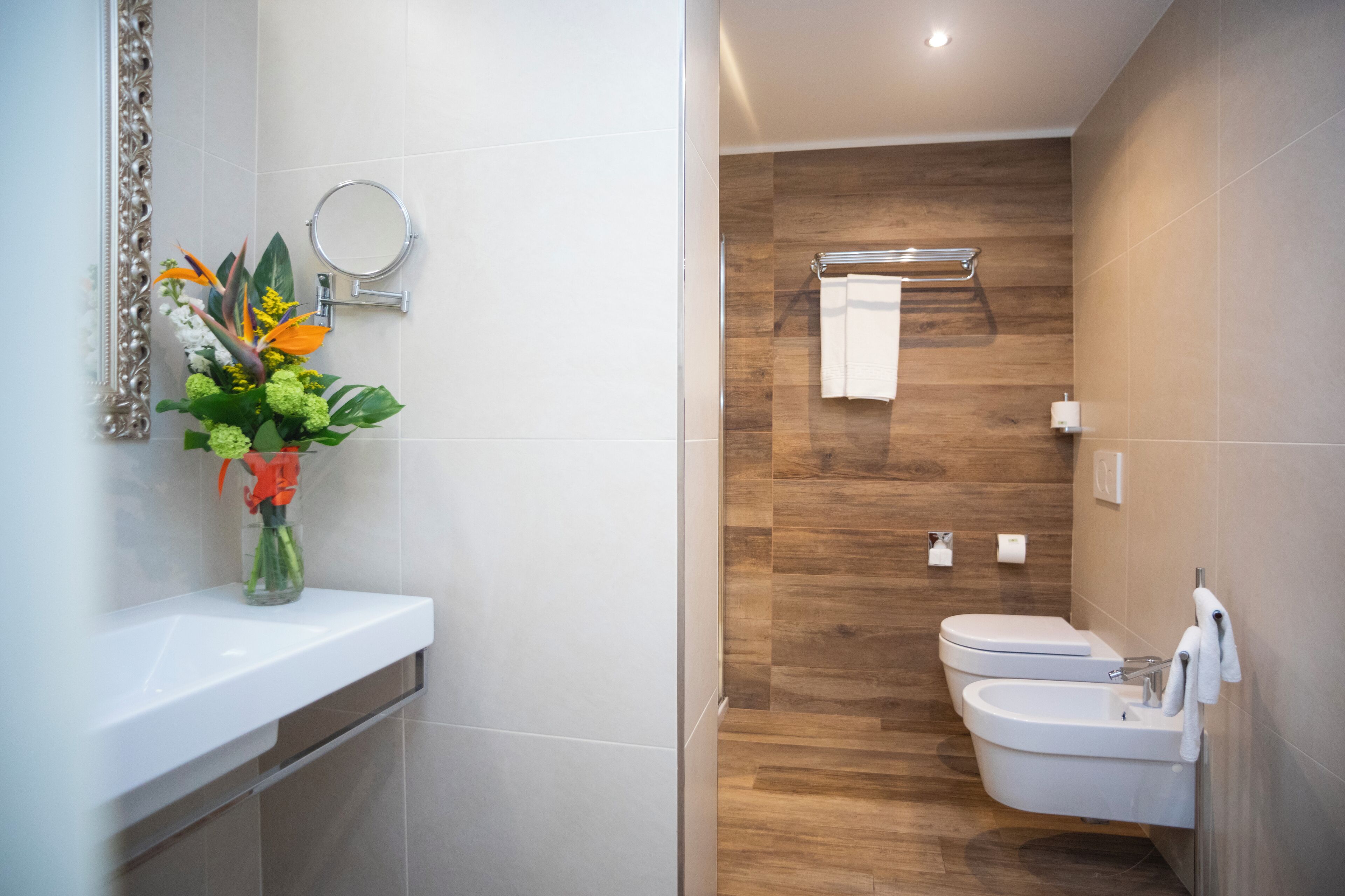superior suite | bathroom | shower, free toiletries, hair dryer, bathrobes