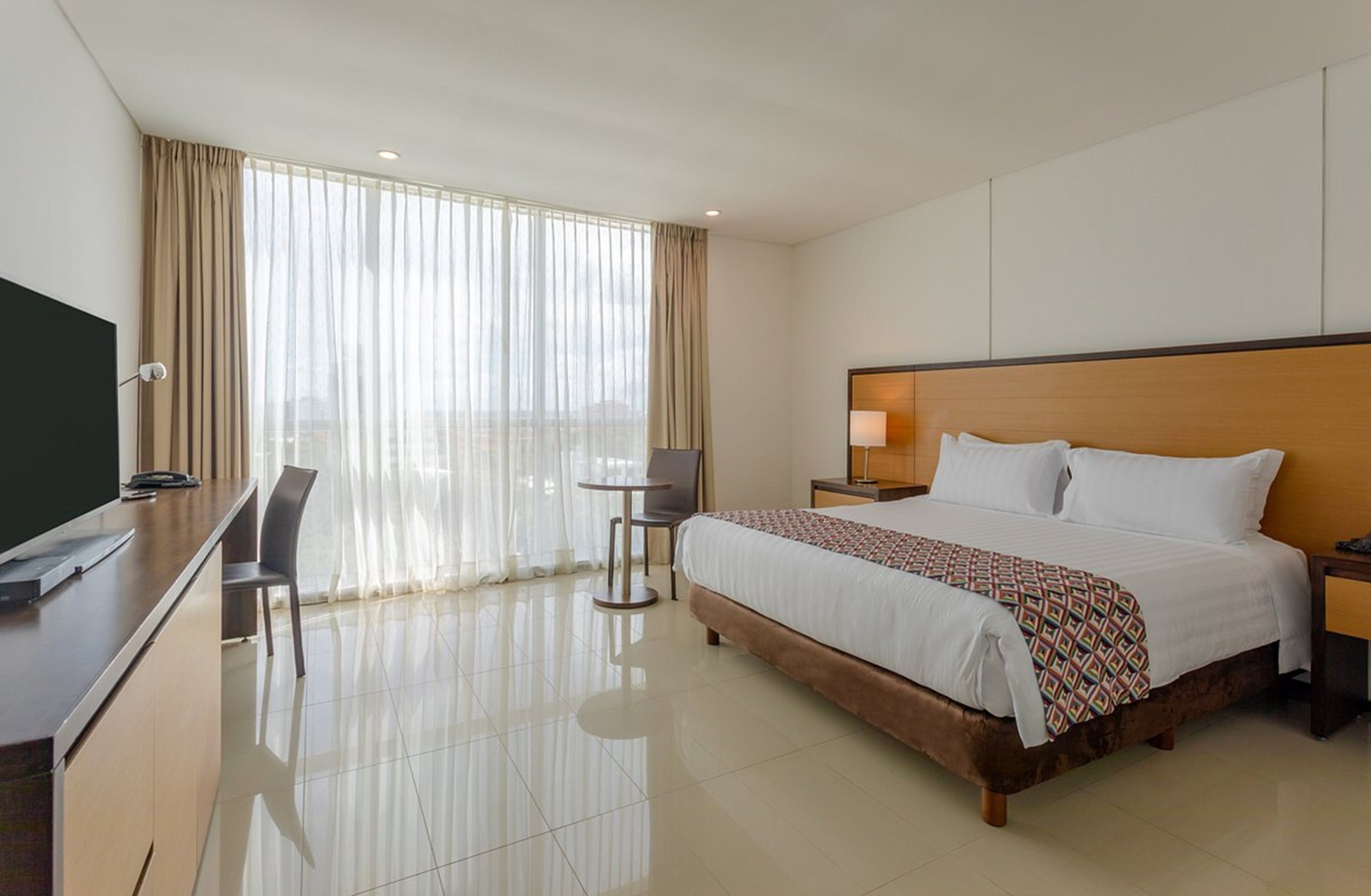 Habitación Deluxe, 1 cama King size | Ropa de cama de alta calidad y minibar 