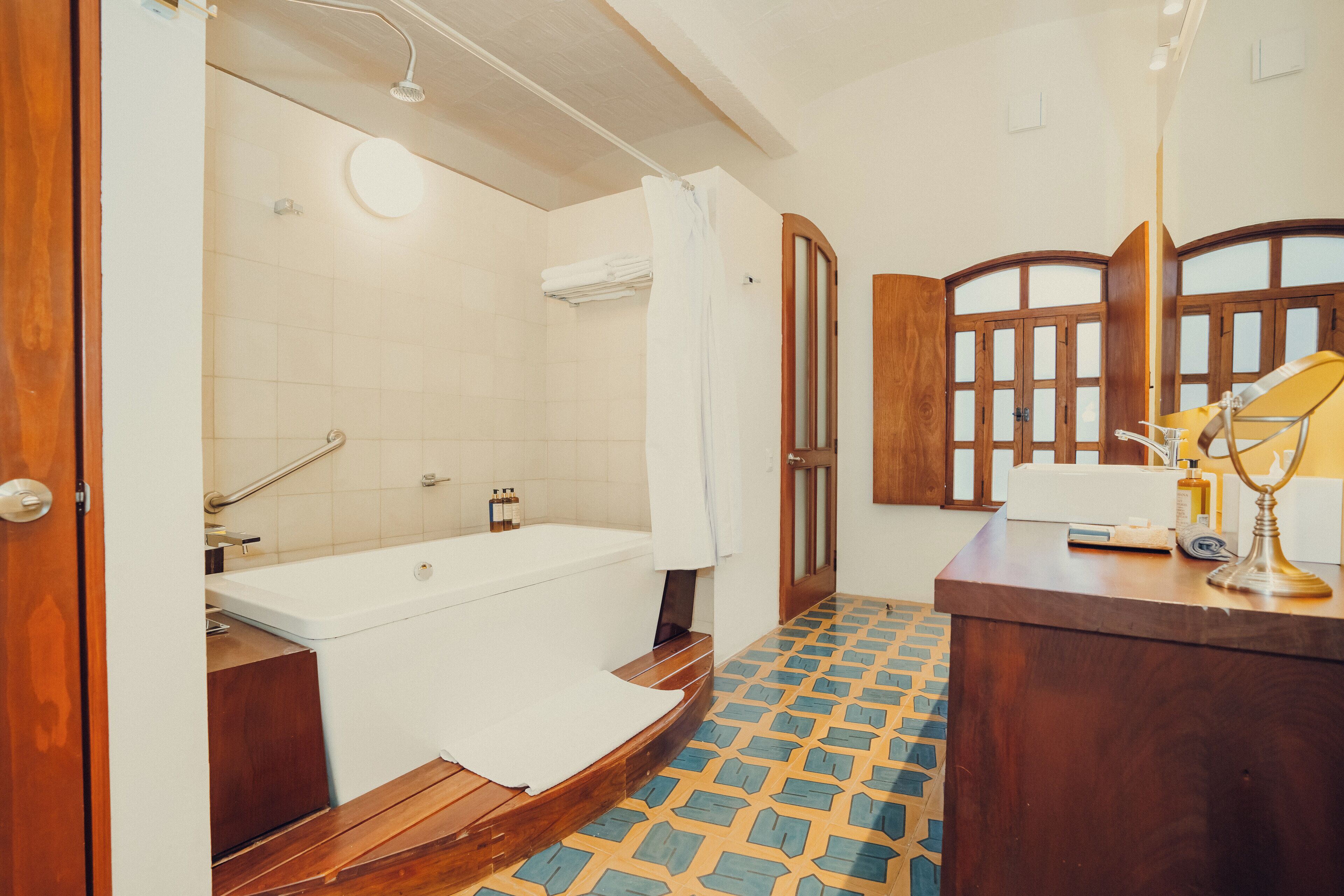 villalobos suite | bathroom | designer toiletries, hair dryer, bathrobes, slippers