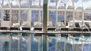 Indoor pool, outdoor pool, open 7 AM to 8 PM, pool loungers