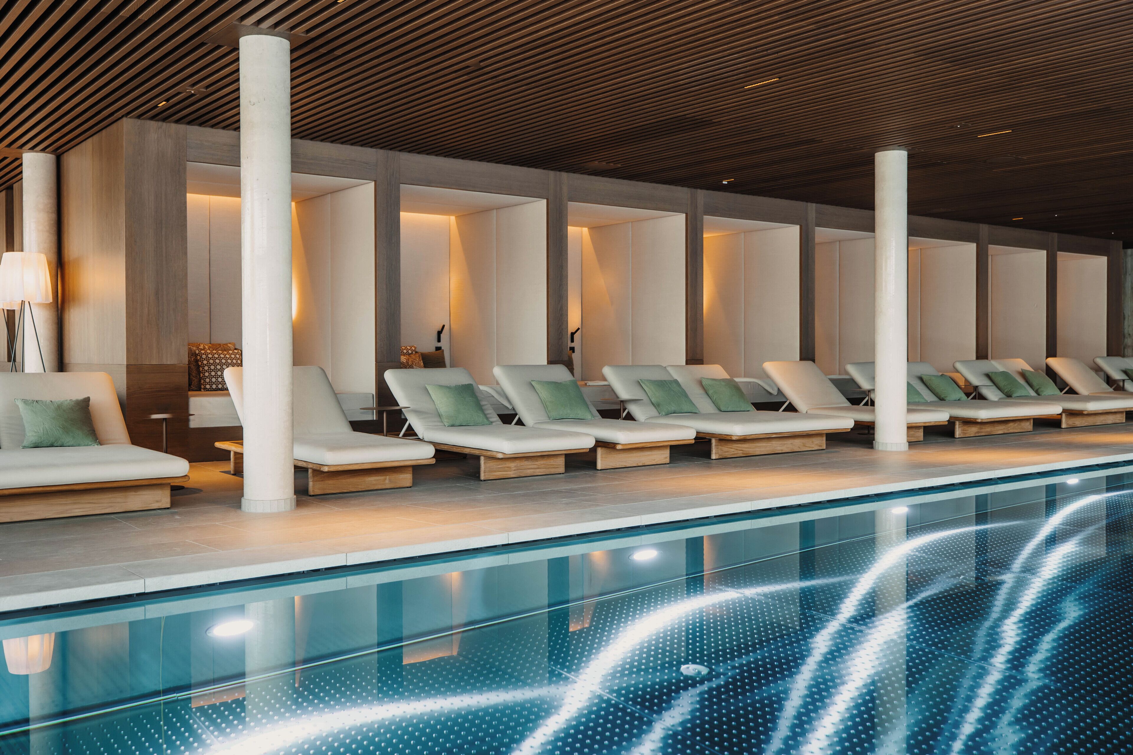 2 indoor pools, outdoor pool, open 7 AM to 8 PM, pool loungers