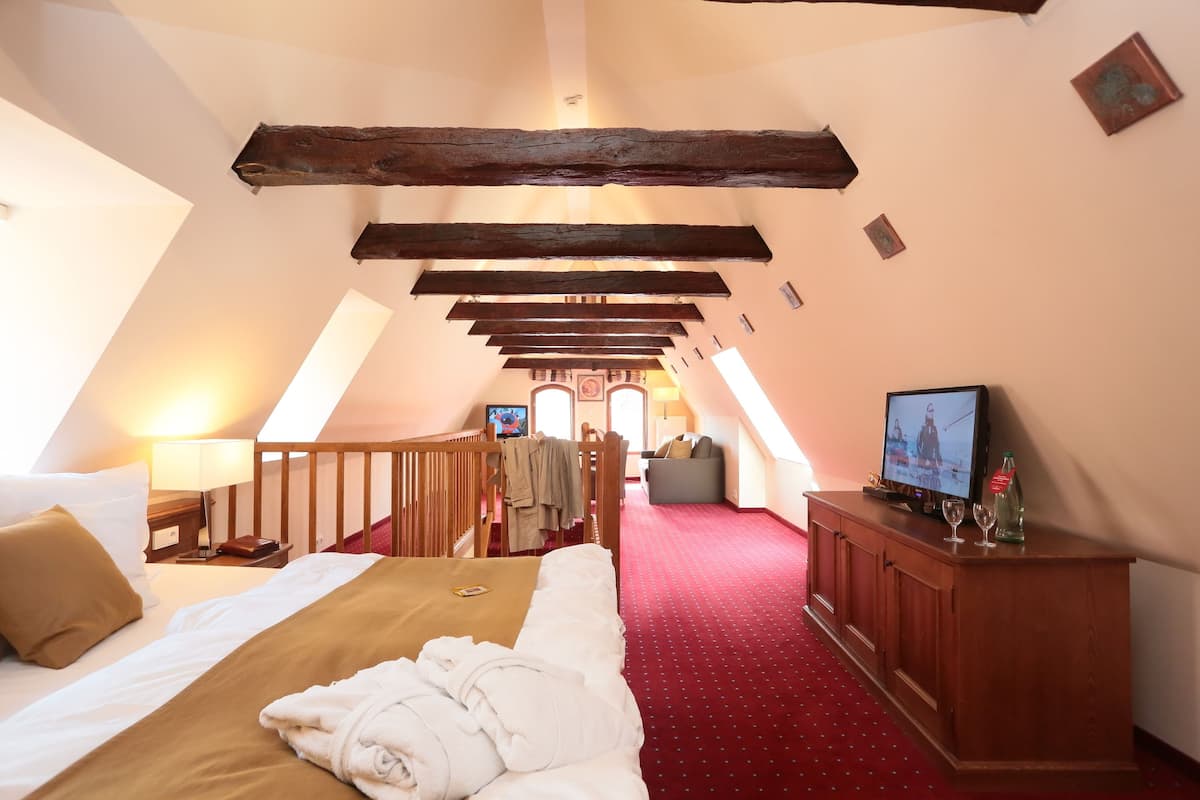 Suite Junior | 1 chambre, literie hypoallergénique, minibar