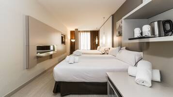 Premium bedding, down duvets, memory-foam beds, minibar
