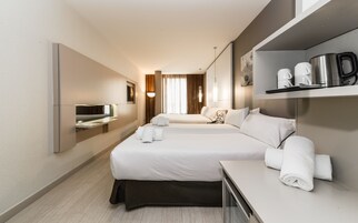 Premium bedding, down duvets, memory-foam beds, minibar
