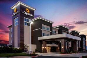 A hotel with a modern design, featuring a prominent 'La Quinta' sign on the facade. - La Quinta Inn & Suites by Wyndham Odessa North (Odessa)
