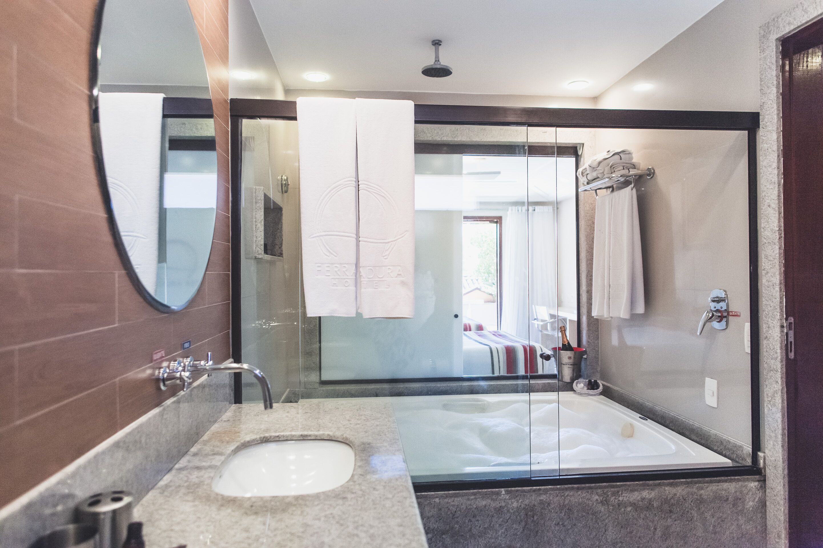 suite resort | bathroom | hair dryer, towels