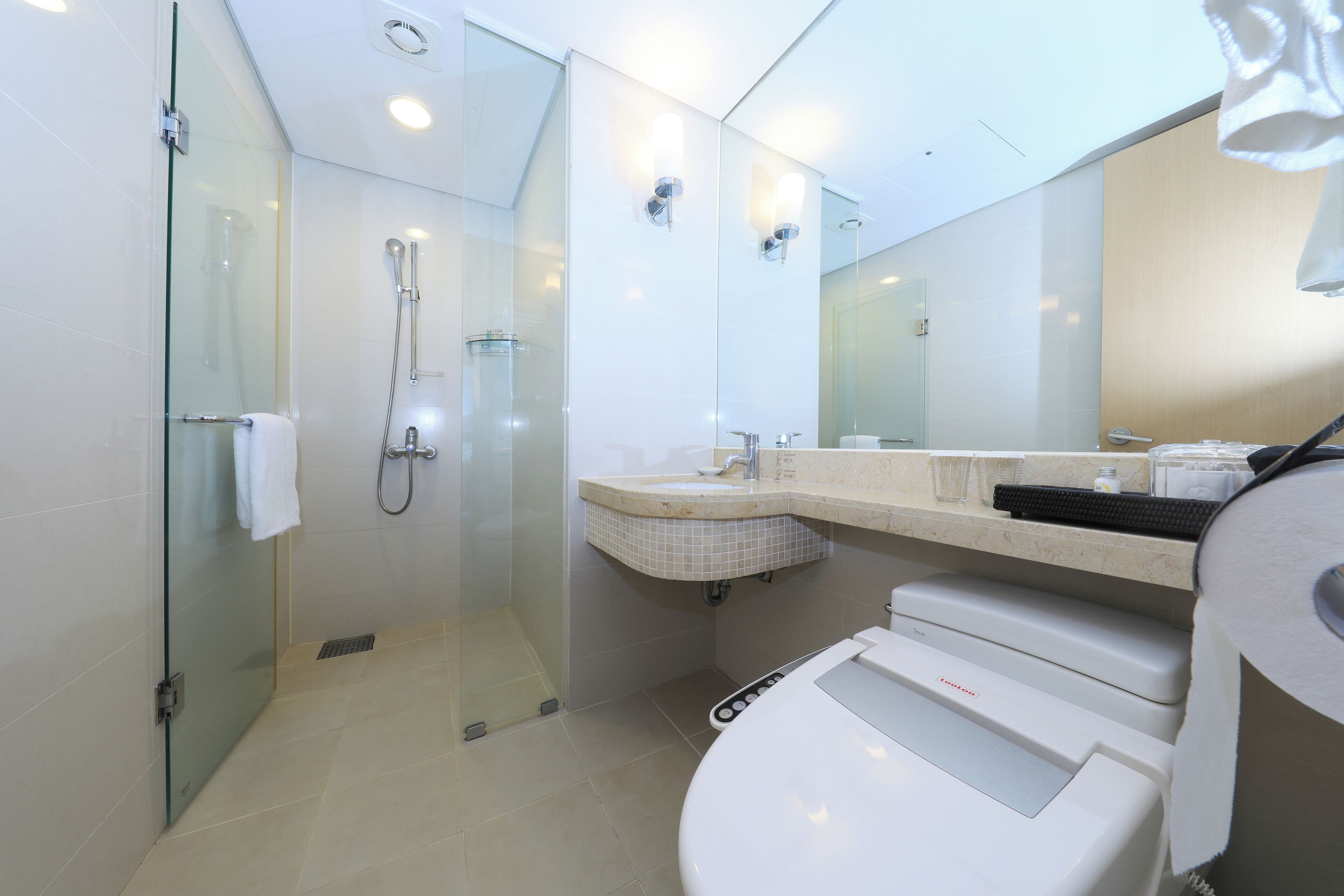 hair dryer, bathrobes, slippers, towels