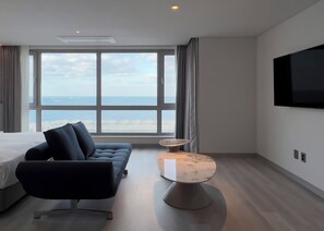 Habitación doble familiar, vista al océano (Superior) | Ropa de cama de alta calidad y edredón