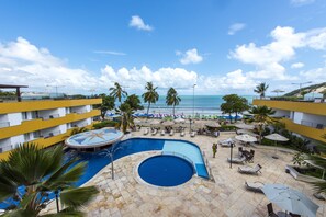 Outdoor pool, pool umbrellas, sun loungers