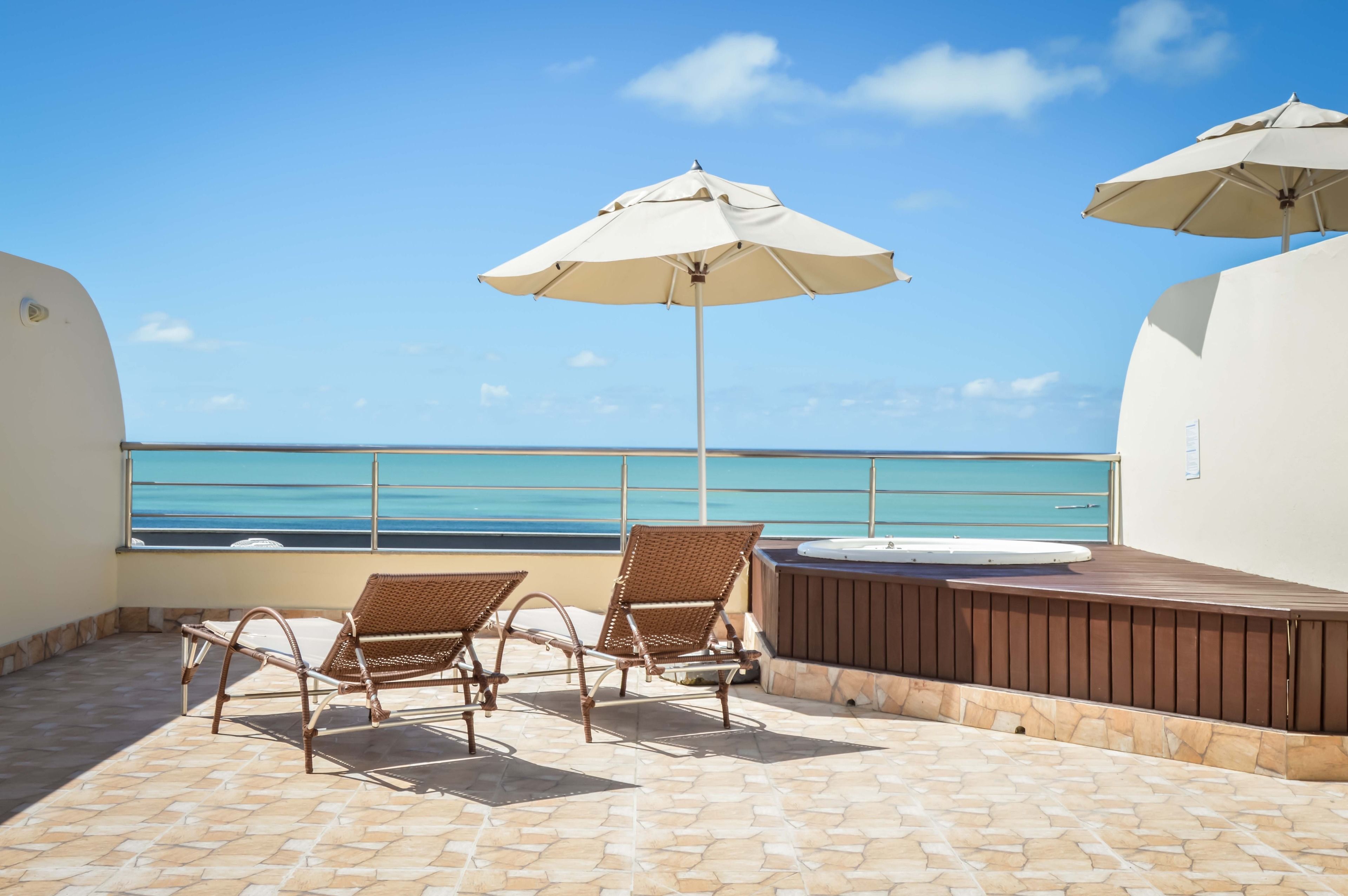 duplex, 2 bedrooms, hot tub, sea view | 1 bedroom, minibar, in-room safe, free cots/infant beds