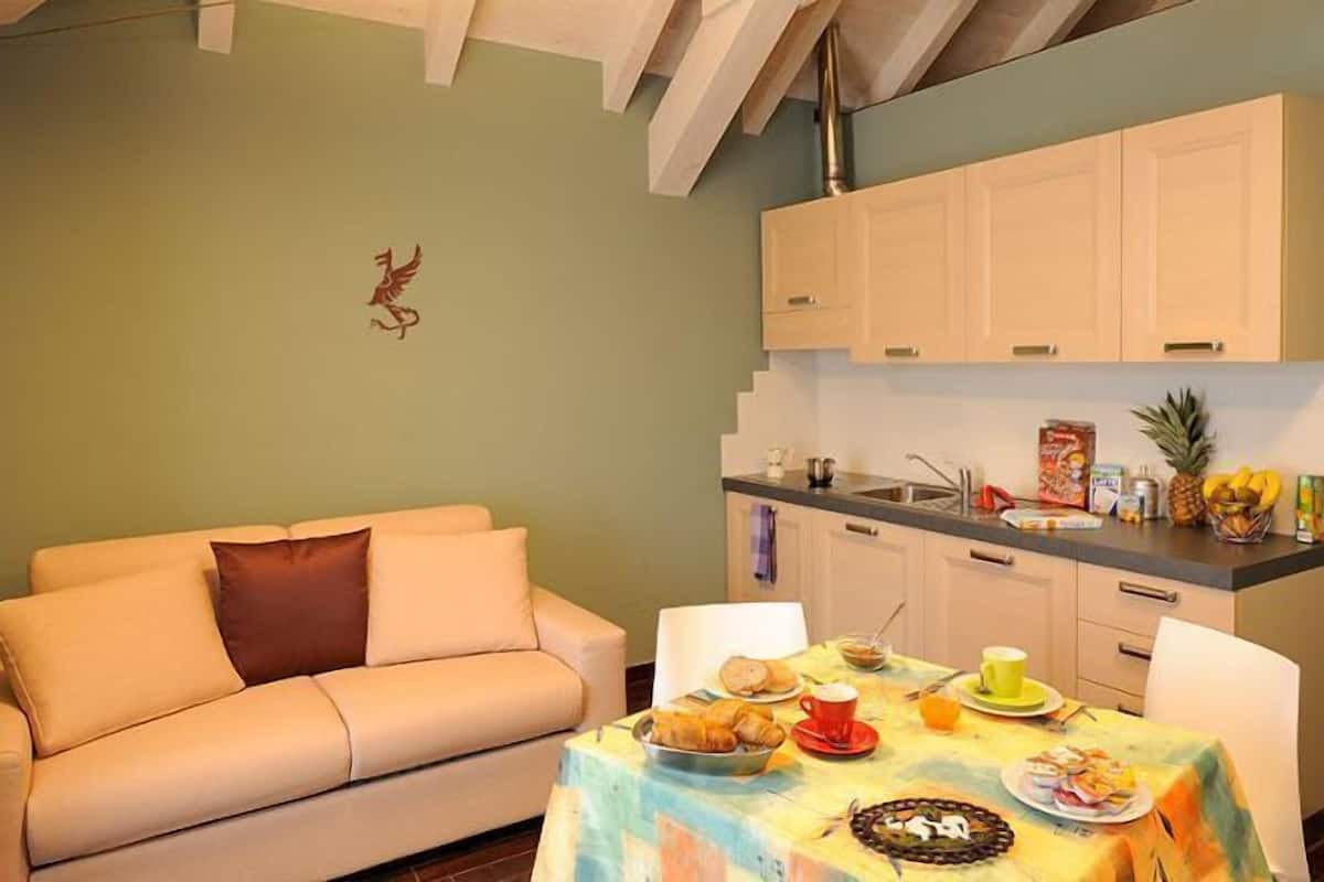 standard apartment, 1 bedroom | living area | flat-screen tv