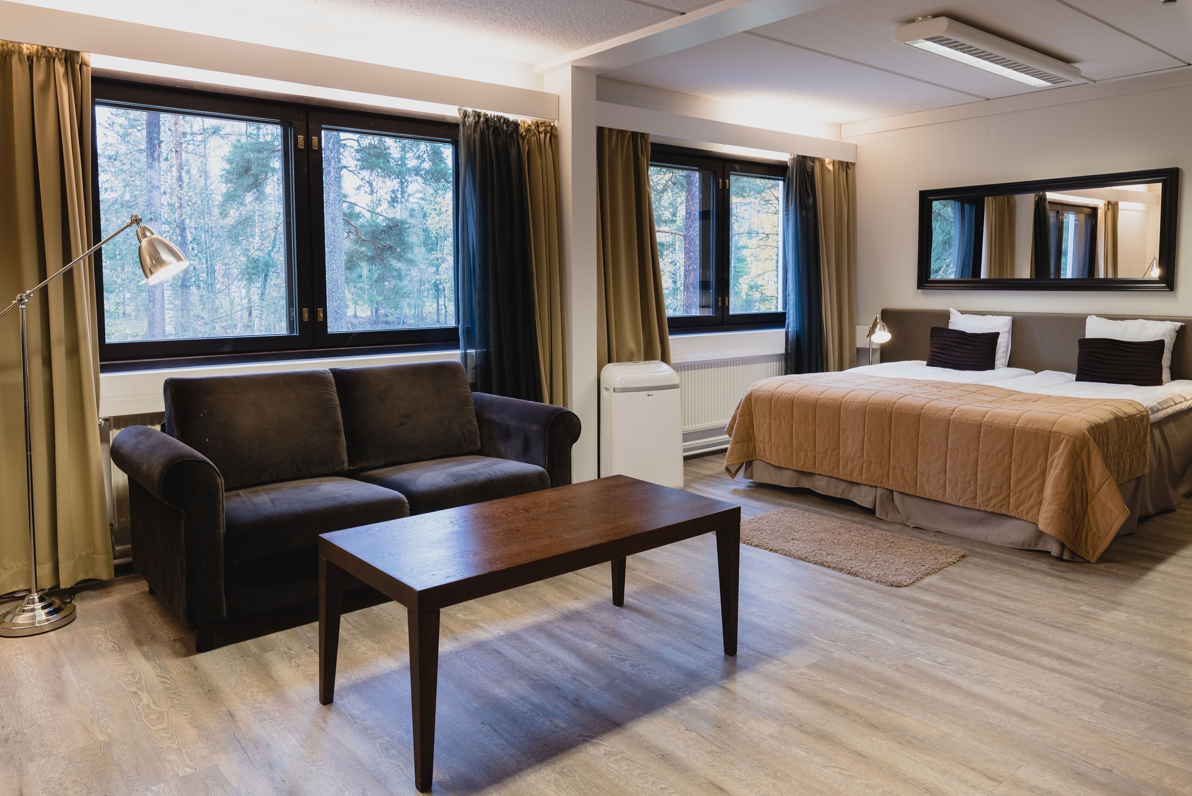 family room | premium bedding, desk, laptop workspace, blackout curtains