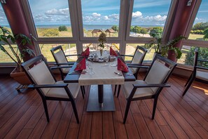 Lunch, dinner served; Regional cuisine, alfresco dining