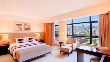 Premium bedding, down comforters, in-room safe, desk