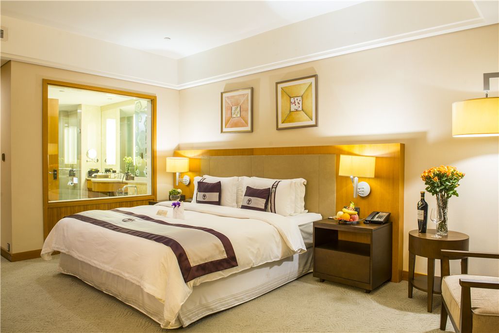 elite executive suite | premium bedding, down duvets, in-room safe, desk