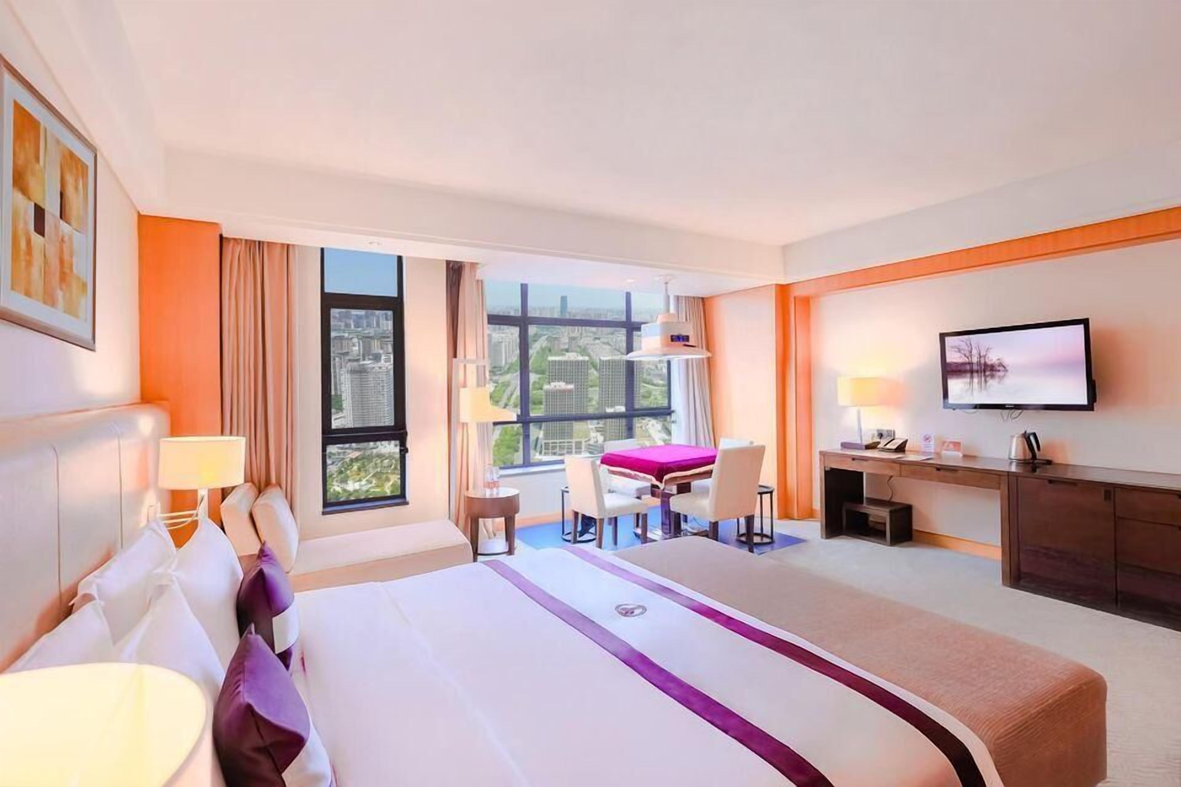 Premium bedding, down comforters, in-room safe, desk