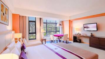 Premium bedding, down comforters, in-room safe, desk