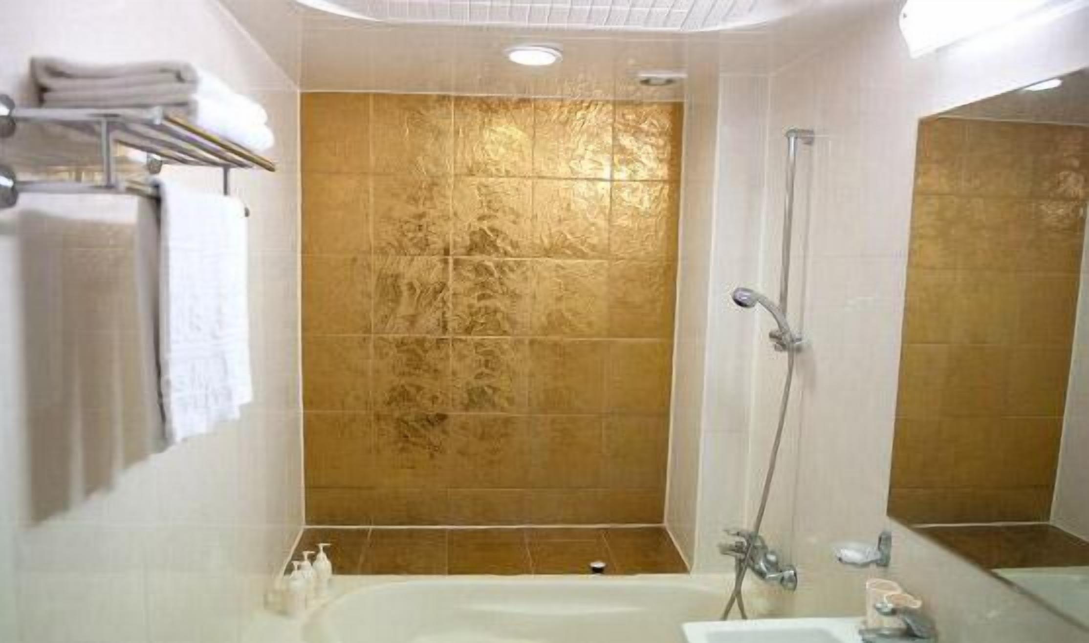 hair dryer, dressing gowns, slippers, towels