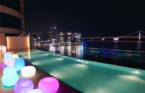 Seasonal outdoor pool, open 9:00 AM to 9:00 PM, sun loungers