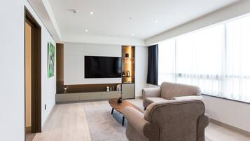 Suite, 2 Bedrooms | Living area | Flat-screen TV